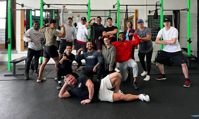 Group of trainees at a Show Up Fitness seminar
